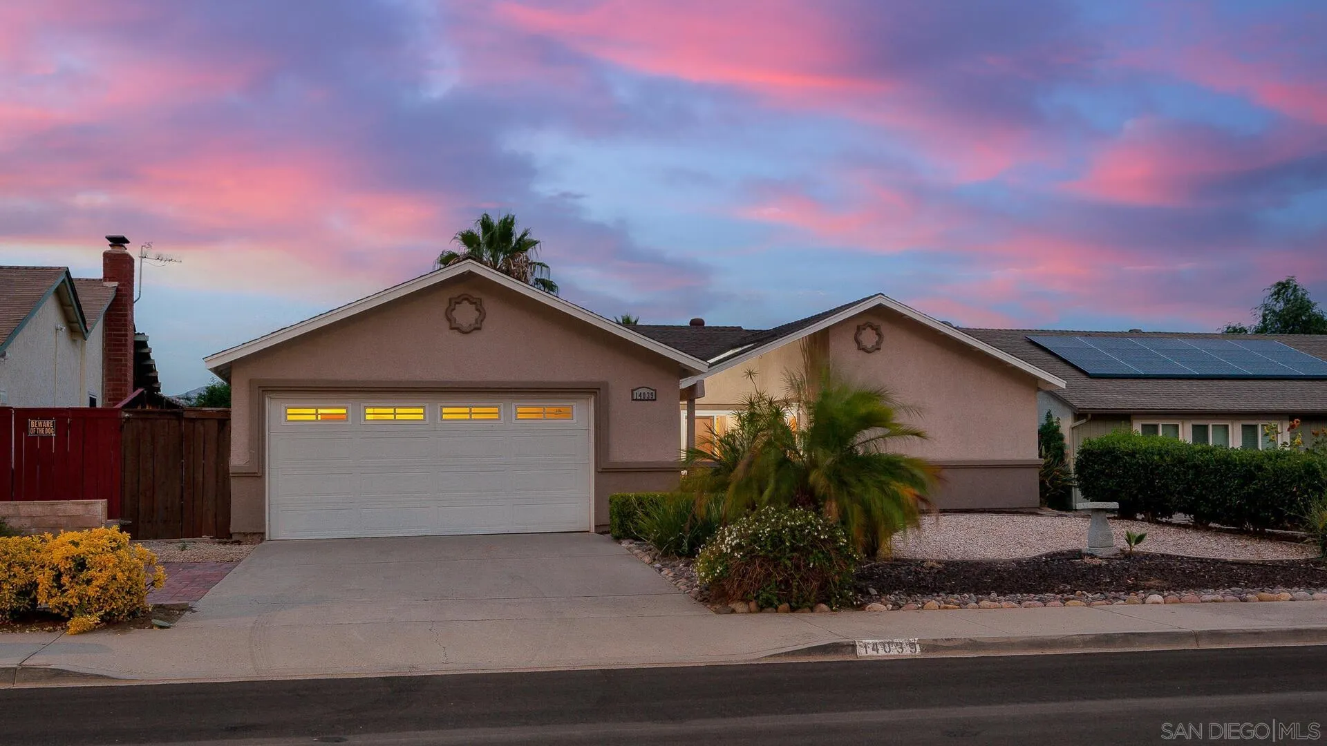 14039 Hermosillo Way Poway, CA 92064 - Photo 31 of 31 a front view of a house with a yard and garage