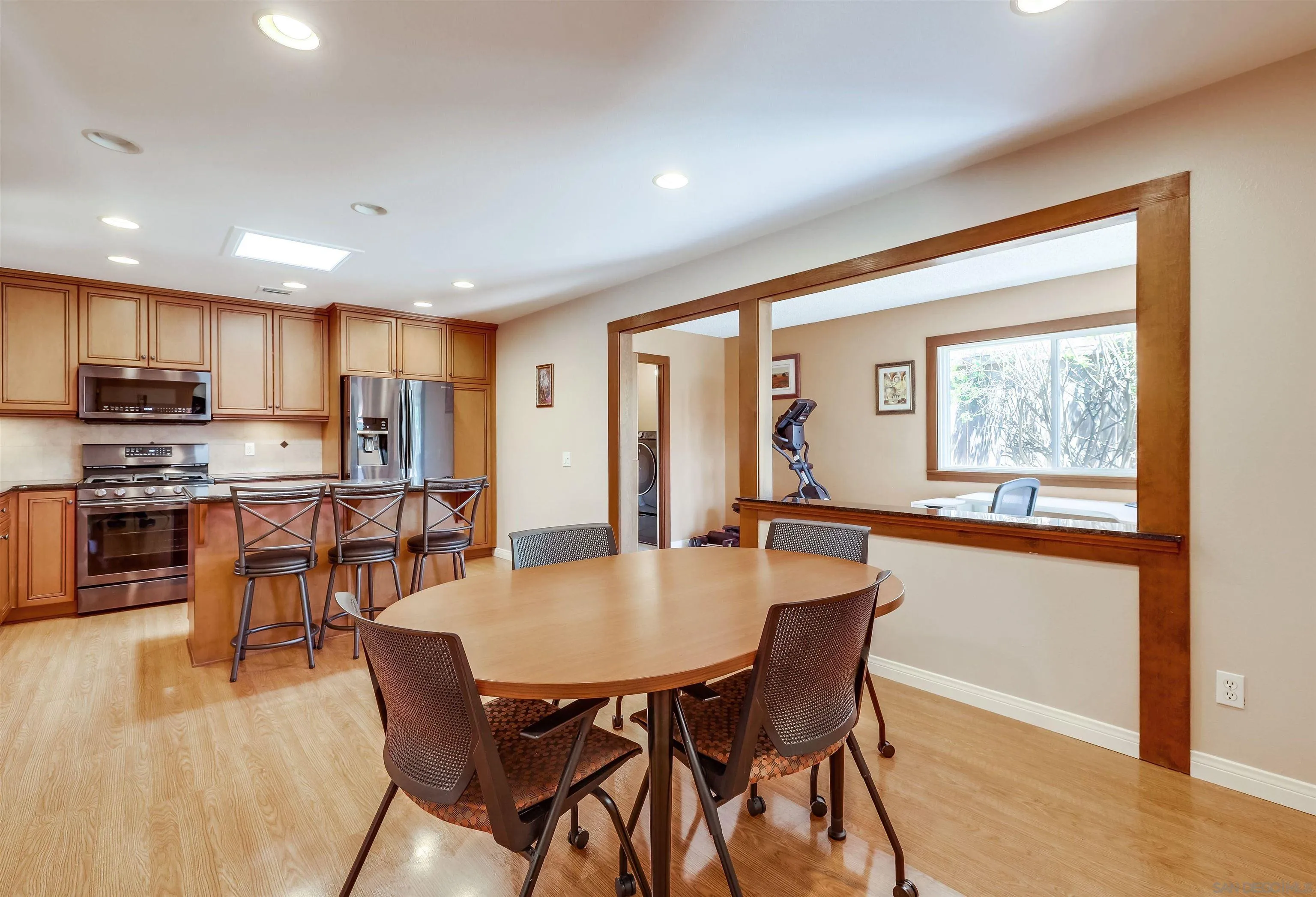 14039 Hermosillo Way Poway, CA 92064 - Photo 5 of 31 a view of a dining room with furniture window and wooden floor