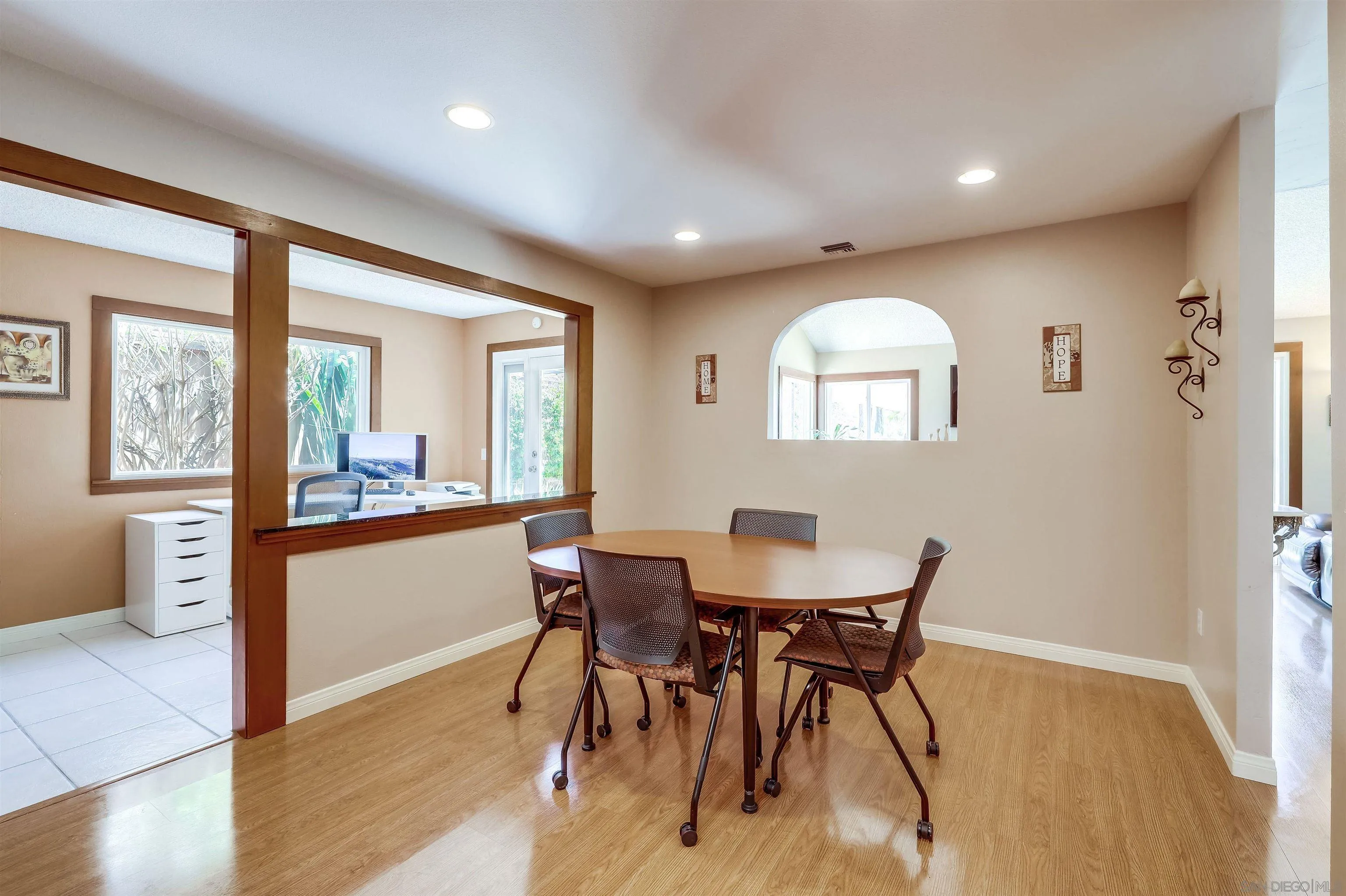 14039 Hermosillo Way Poway, CA 92064 - Photo 6 of 31 a view of a dining room with furniture window and wooden floor