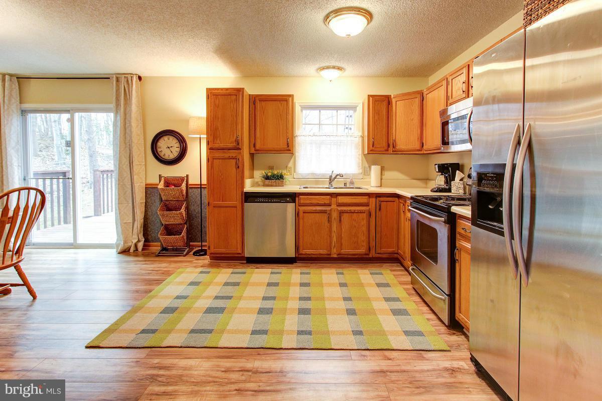 Kitchen also has New Laminate Flooring!