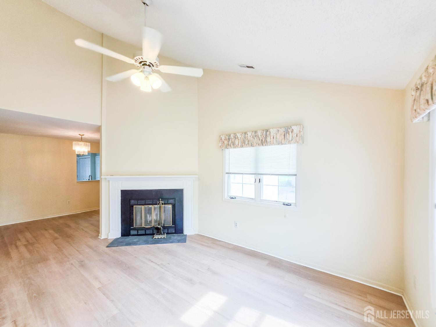 1 H Rutland Lane Monroe Township, NJ 08831 - Photo 20 of 26 a view of an empty room with a window
