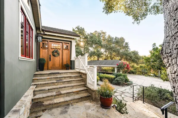 a front view of a house with a porch