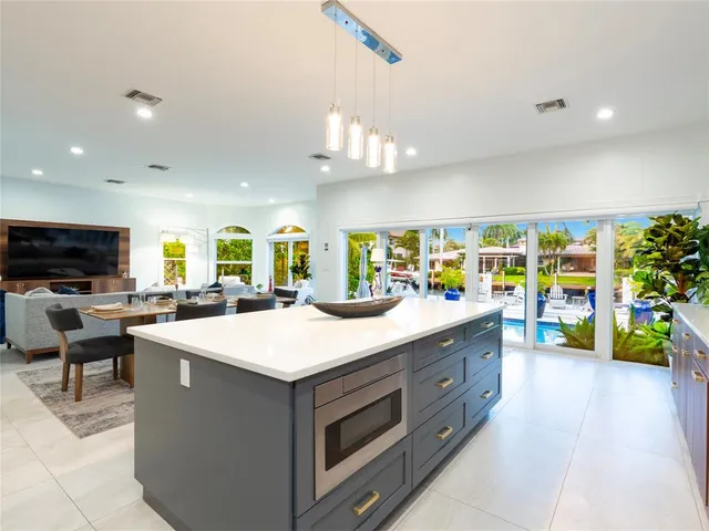 a spacious bedroom with a large bed and a couch