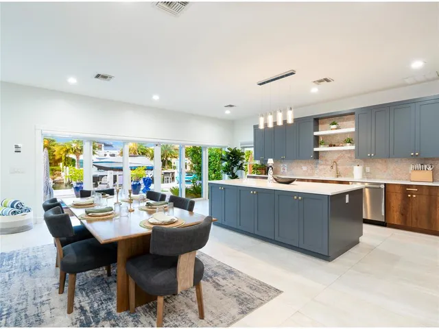 a large white bed in a white room