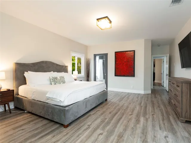 a bathroom with a bathtub and shower