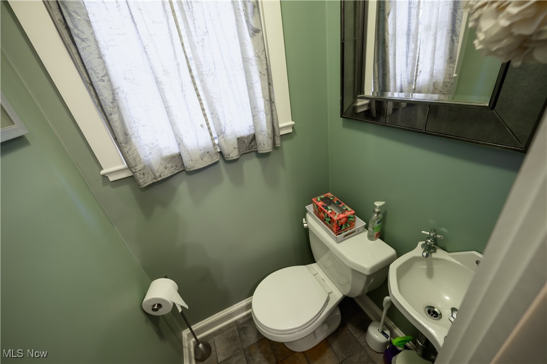 1636 Oakmount Road Cleveland, OH 44121 - Photo 11 of 26 half bath main floor