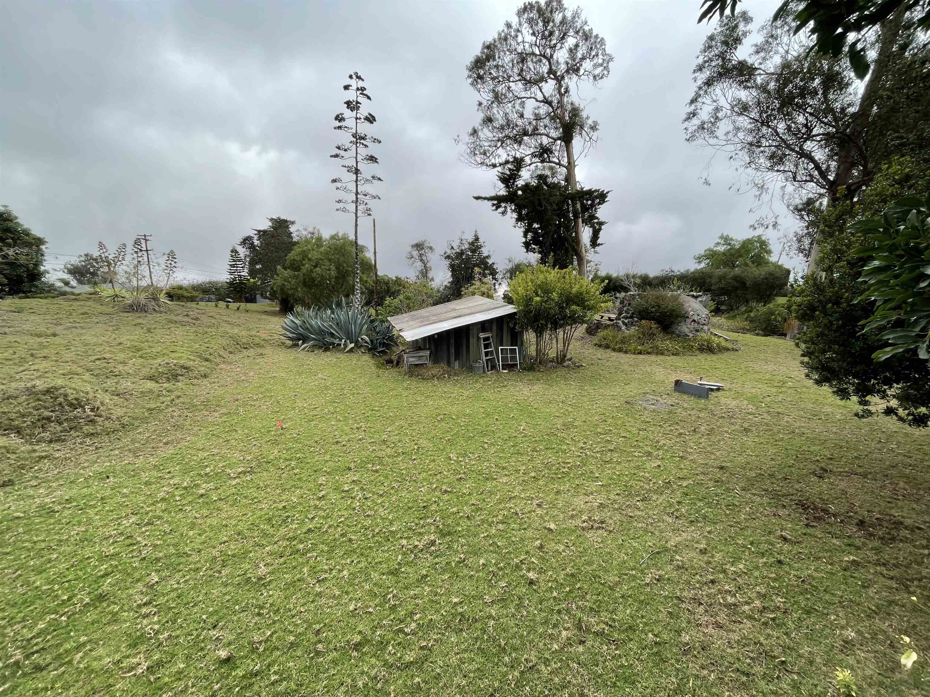 1575 Kamehameiki Road, Unit 1 Kula, HI 96790 - Photo 27 of 37 a view of a lake with houses