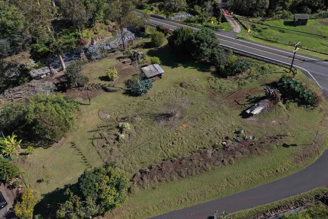an aerial view of residential house with outdoor space