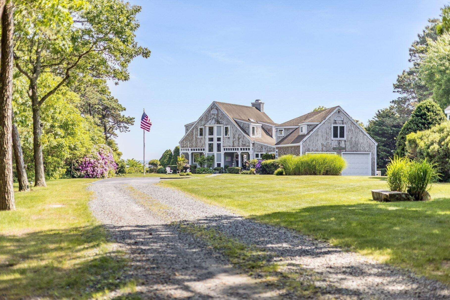 461 Wings Neck Road Pocasset, MA 02559 - Photo 35 of 42 a house with a big yard and large trees