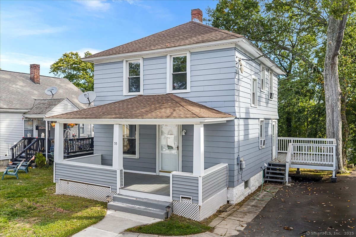 55 Raymond Street New London, CT 06320 - Photo 3 of 31 a front view of a house with a garden