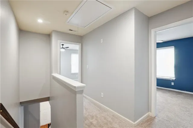 a view of hallway with stairs