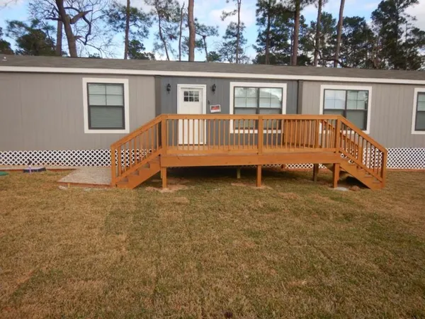 a view of a house with a roof deck