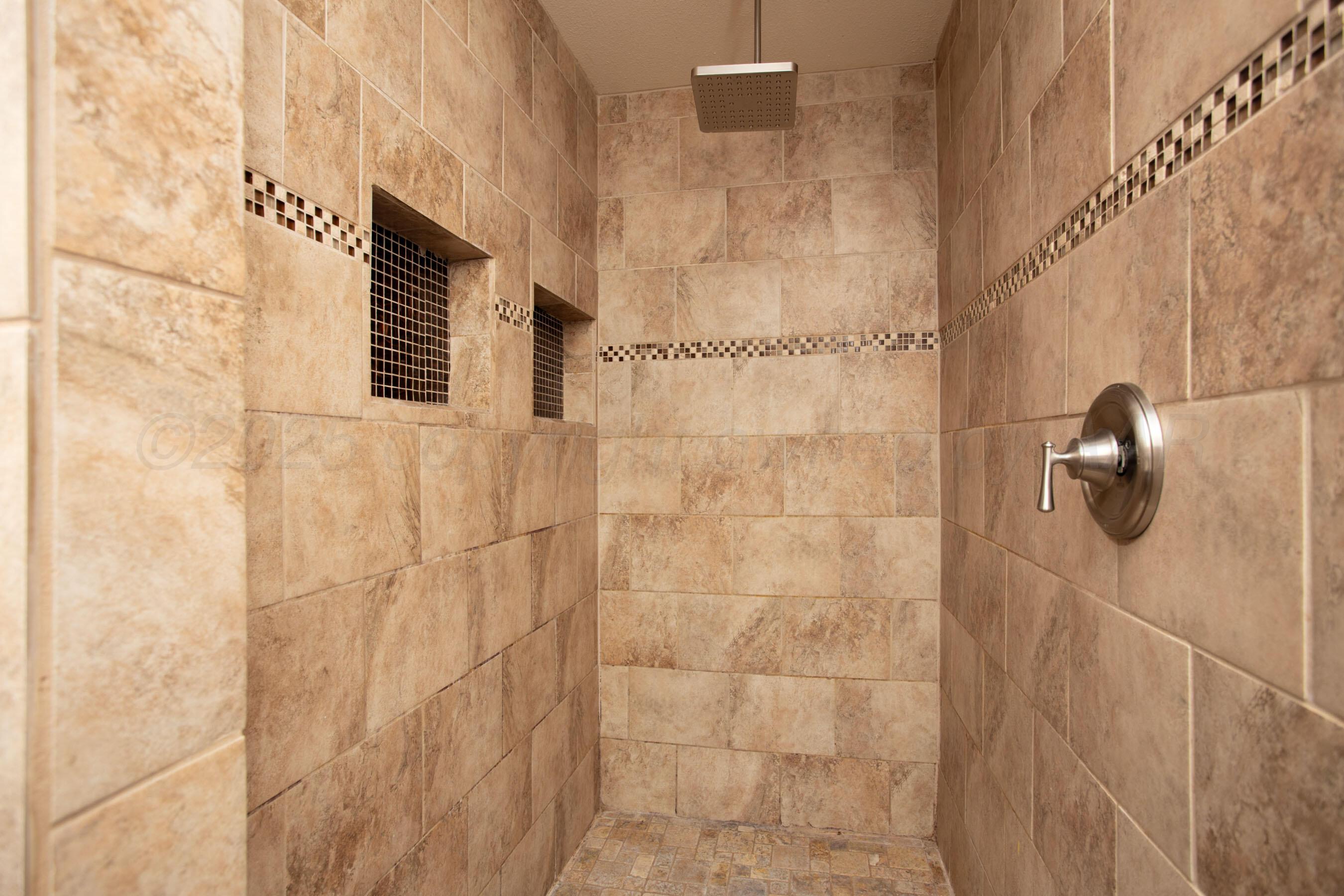 3729 Wayne Street Amarillo, TX 79109 - Photo 19 of 30 a bathroom with a shower