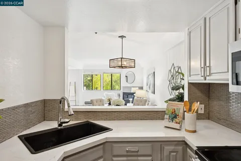 a kitchen with a sink and a cabinets