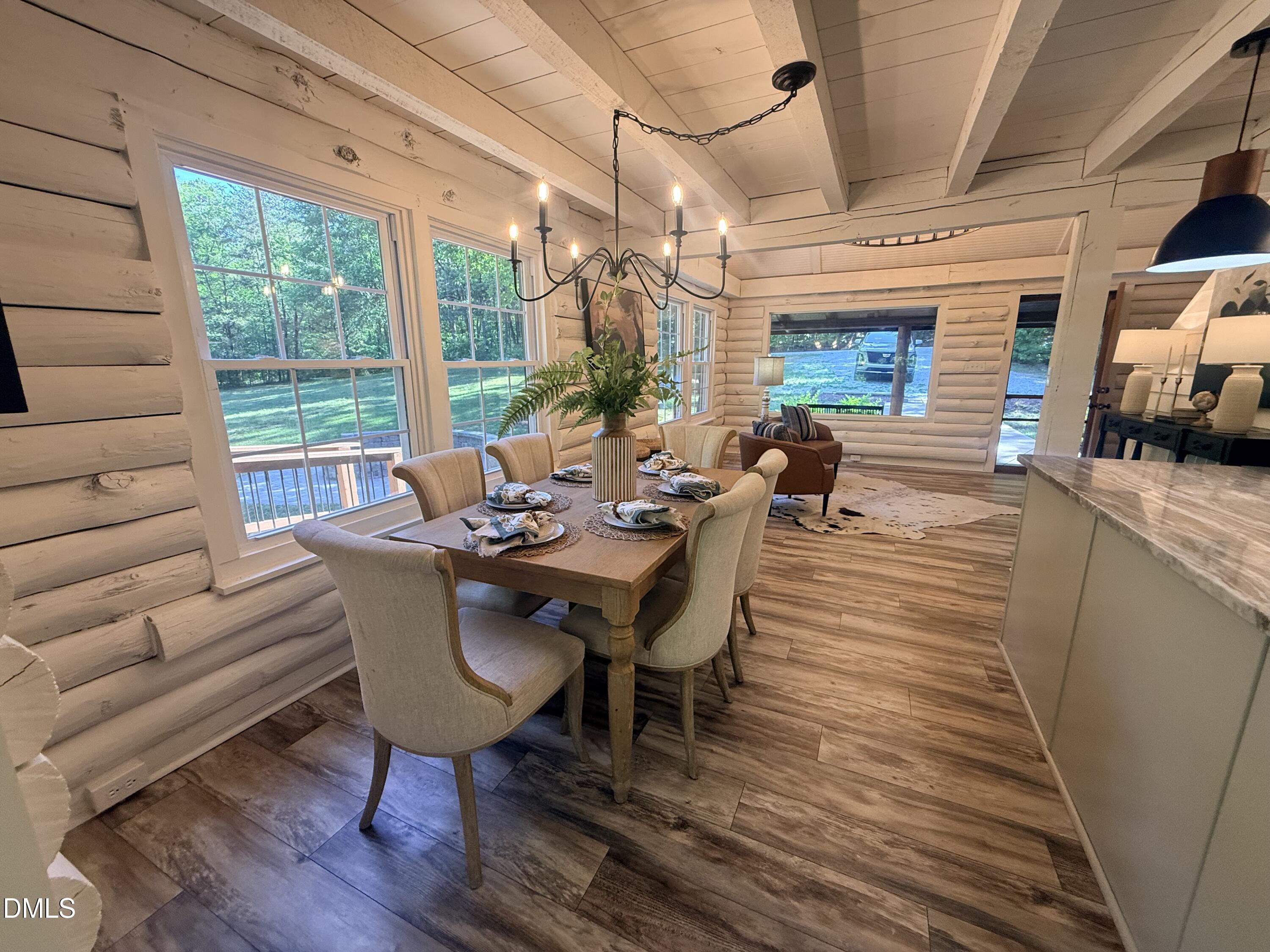 327 Shady Oak Road Roxboro, NC 27574 - Photo 27 of 62 a view of a dining room with furniture window and outside view