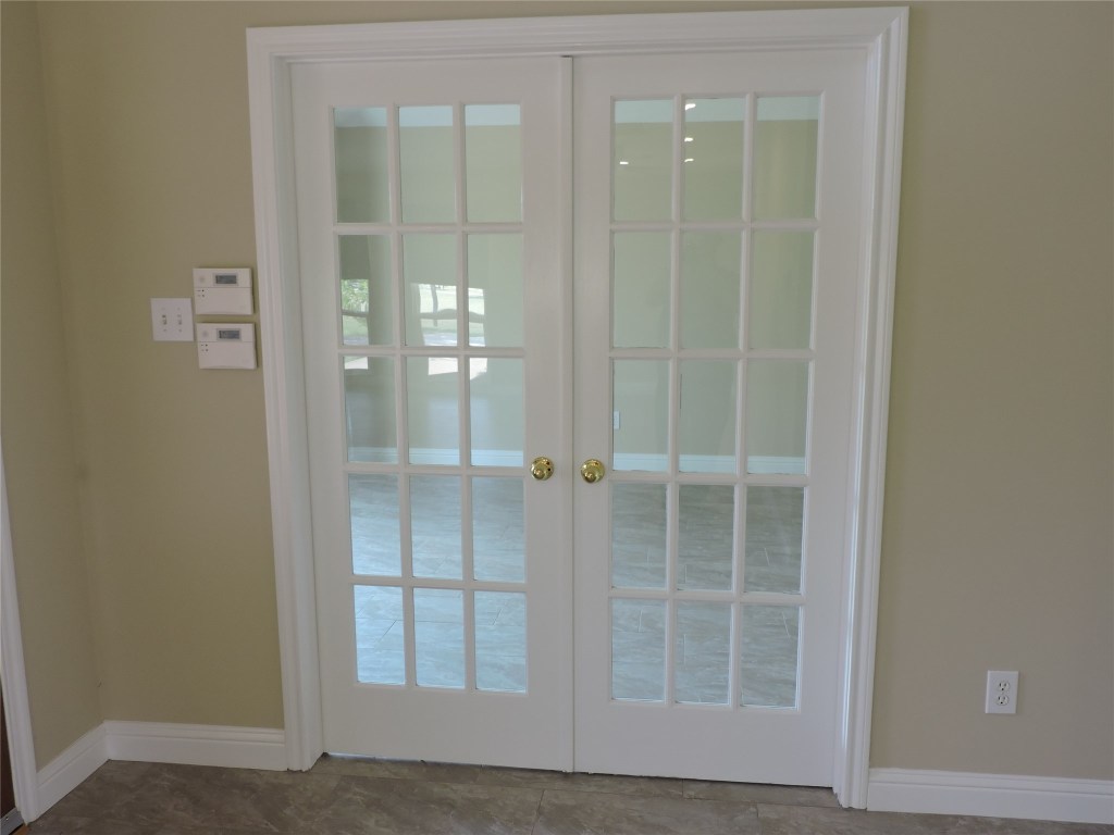 25730 Beckendorff Road Katy, TX 77493 - Photo 11 of 42 an empty room with windows