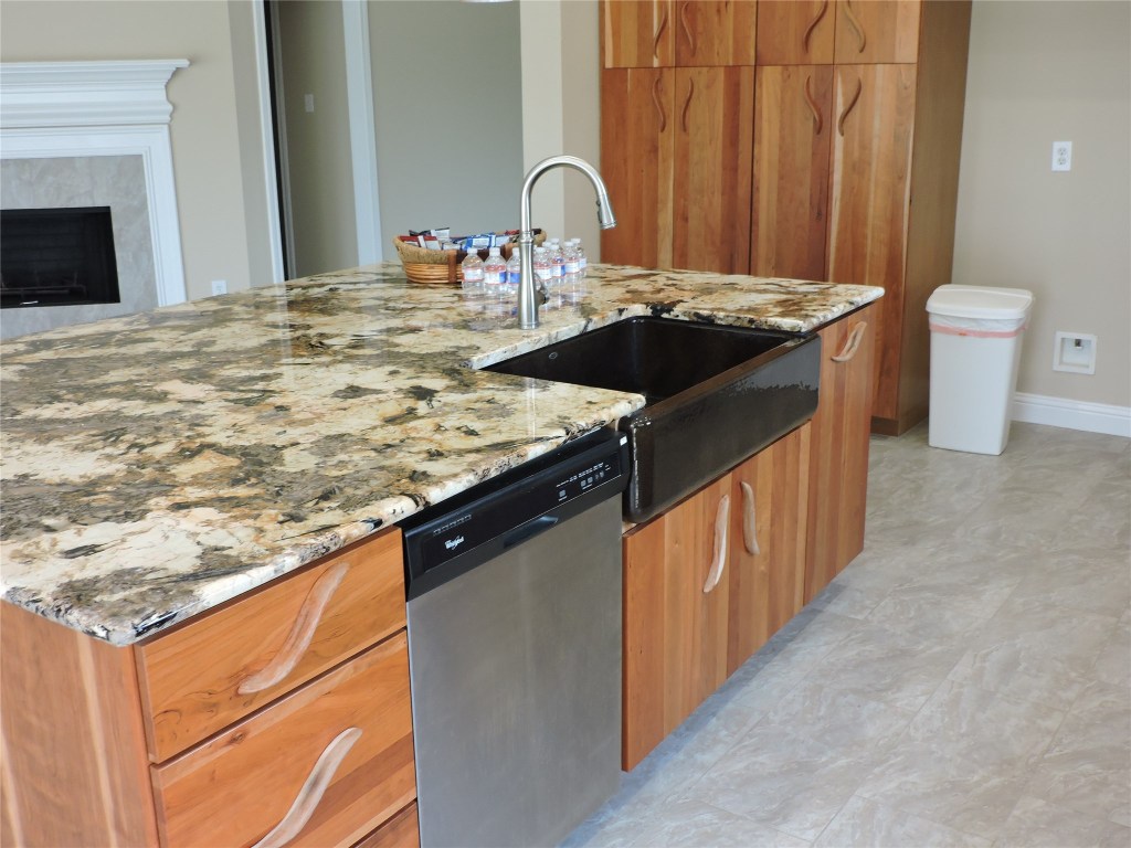 25730 Beckendorff Road Katy, TX 77493 - Photo 18 of 42 a kitchen with a sink and a stove top oven