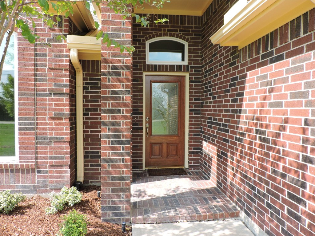25730 Beckendorff Road Katy, TX 77493 - Photo 2 of 42 a front view of a house with a yard