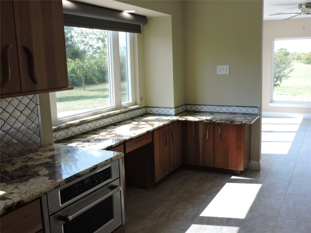 25730 Beckendorff Road Katy, TX 77493 - Photo 23 of 42 a view of kitchen with granite countertop window