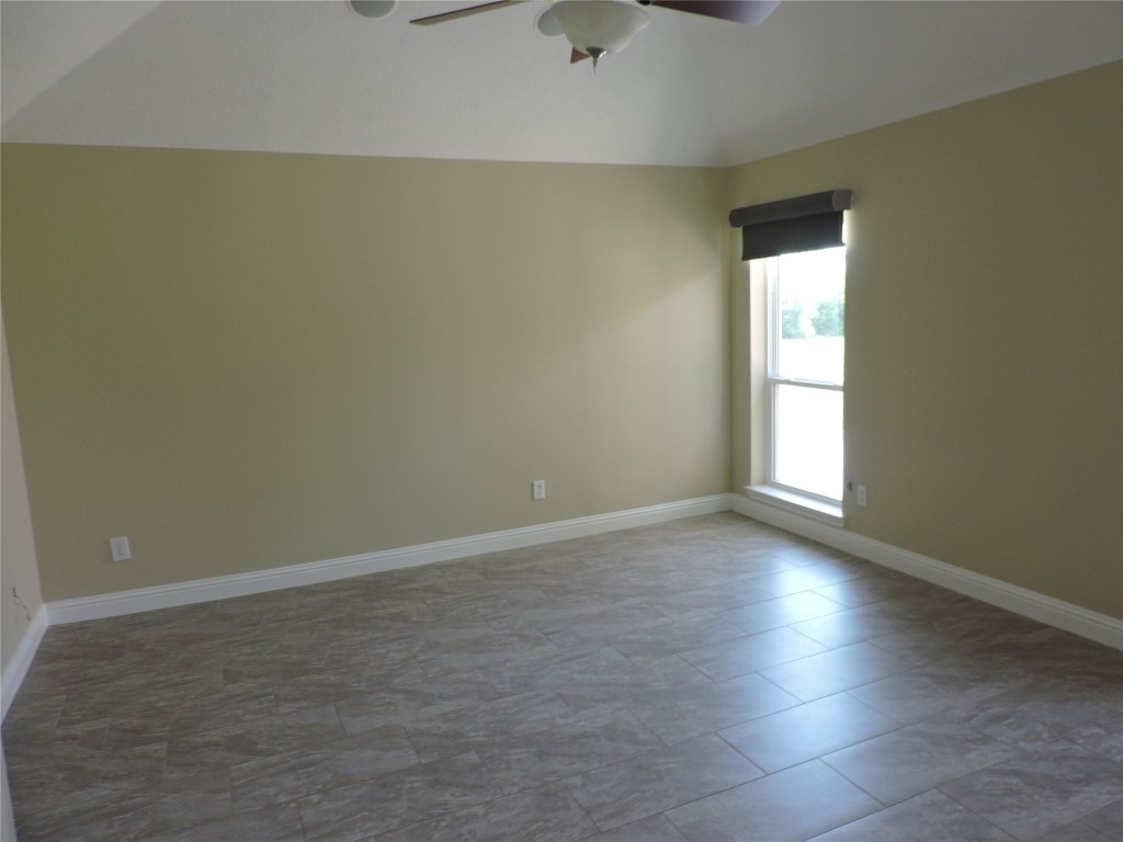 25730 Beckendorff Road Katy, TX 77493 - Photo 29 of 42 an empty room with windows