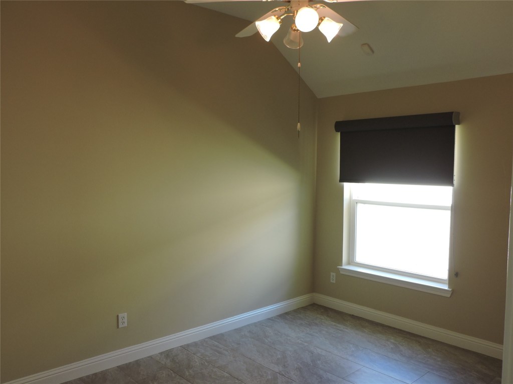25730 Beckendorff Road Katy, TX 77493 - Photo 33 of 42 an empty room with a window