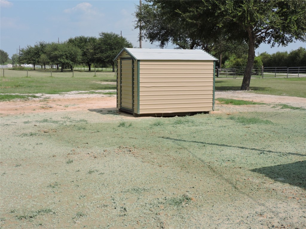 25730 Beckendorff Road Katy, TX 77493 - Photo 38 of 42 a view of a backyard with wooden fence