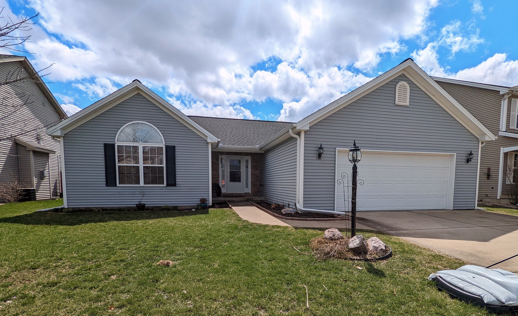 105 Clover Street Savoy, IL 61874 - Photo 1 of 1 a front view of house with yard