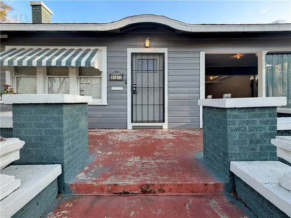 a front view of a house with a garage