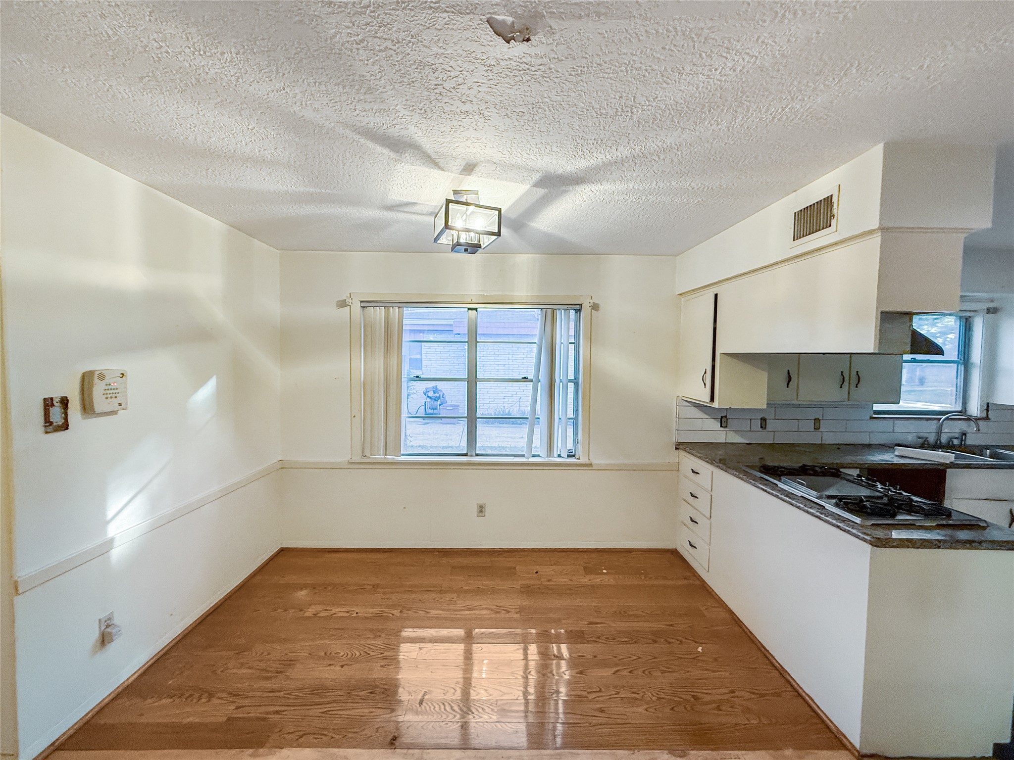 8219 Colgate Street Houston, TX 77061 - Photo 14 of 39 a kitchen with stainless steel appliances granite countertop a stove and a sink