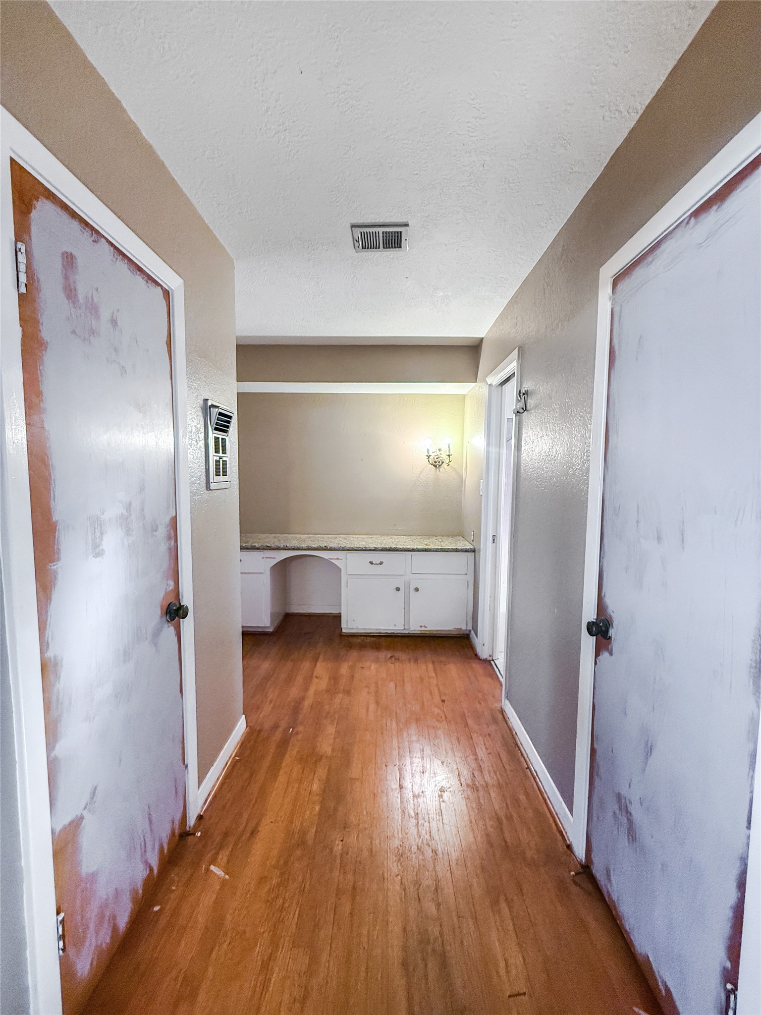 8219 Colgate Street Houston, TX 77061 - Photo 18 of 39 a view of a room with wooden floor a fireplace