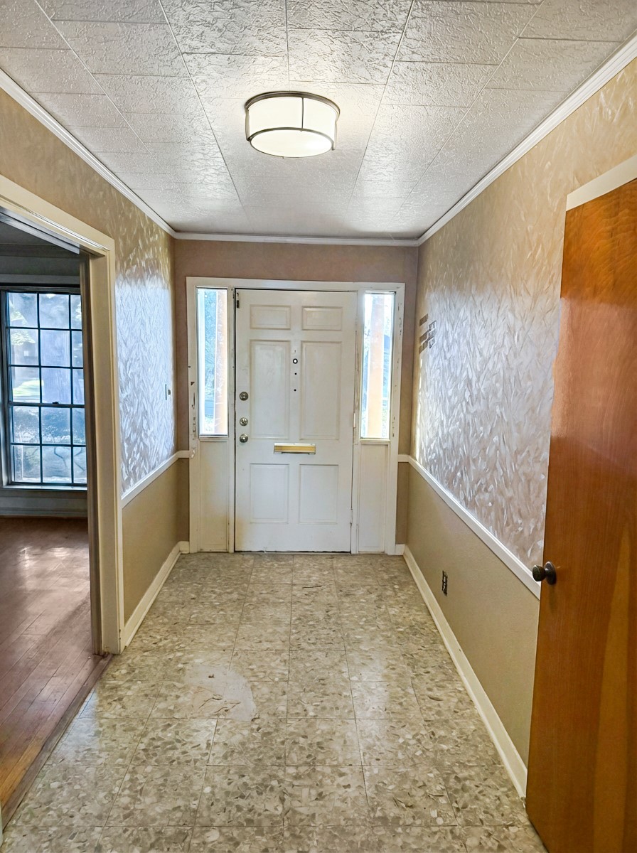 8219 Colgate Street Houston, TX 77061 - Photo 2 of 39 wooden floor in an empty room with a window