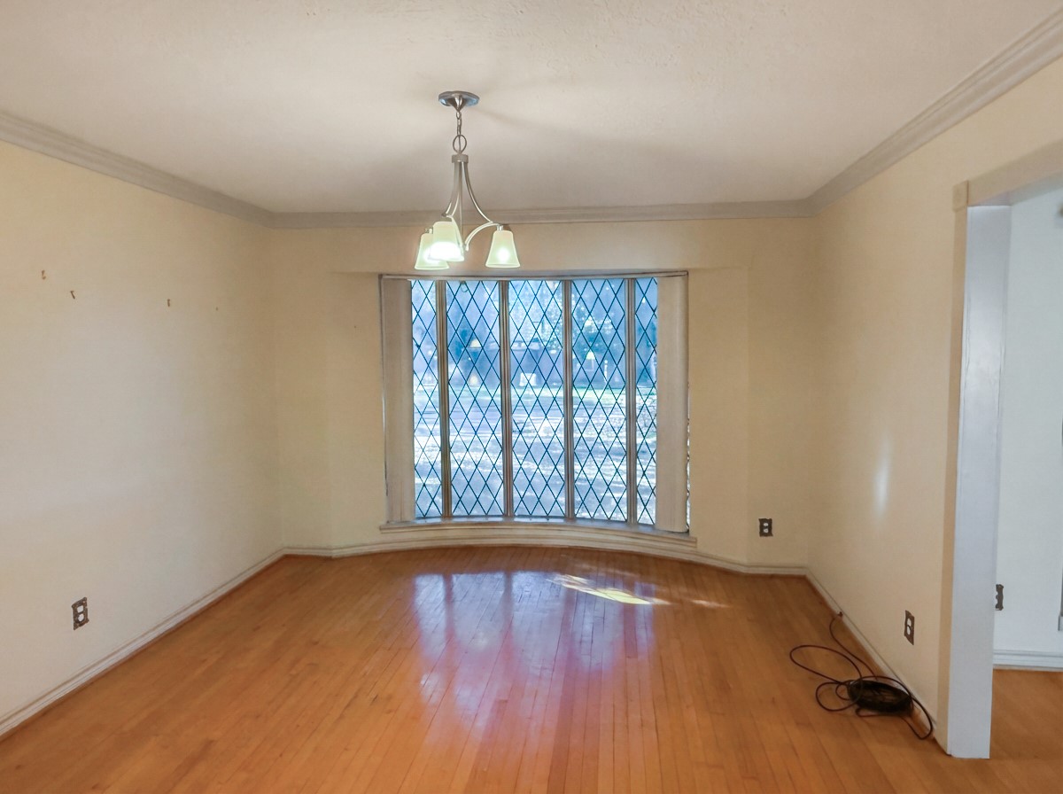 8219 Colgate Street Houston, TX 77061 - Photo 9 of 39 an empty room with a window