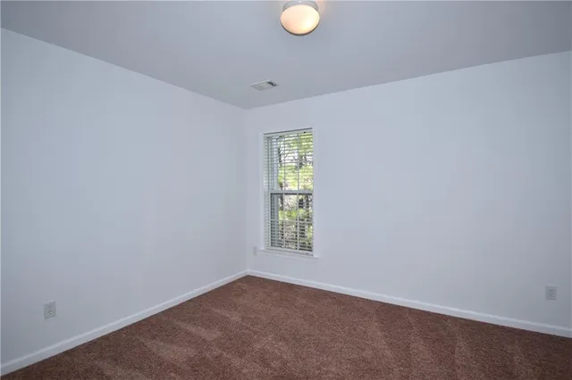 a view of empty room with window