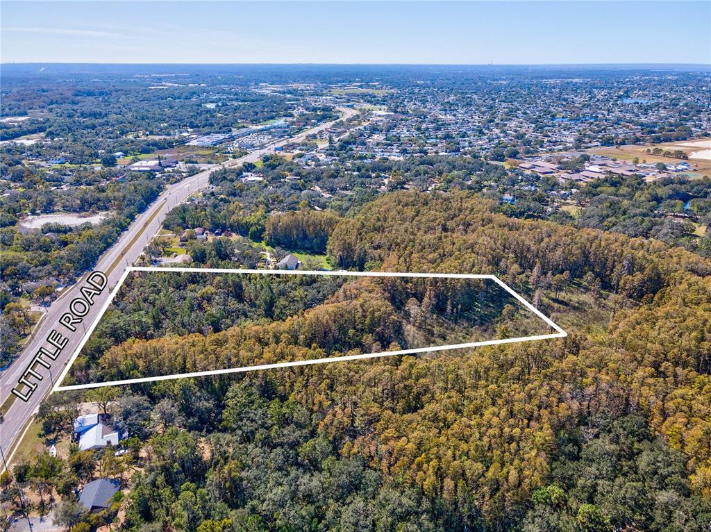 Little Road New Port Richey, FL 34654 - Photo 4 of 5 an aerial view of residential houses with outdoor space