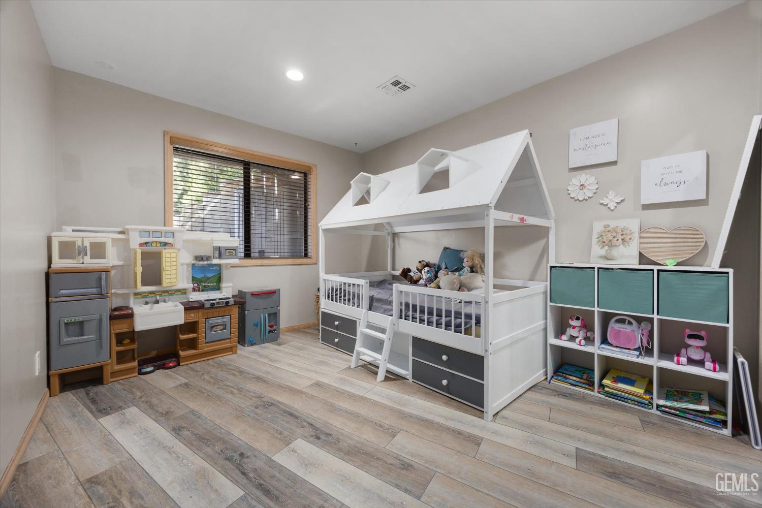 Undisclosed Address Tehachapi, CA 93561 - Photo 30 of 62 a bedroom with furniture and a wooden floor