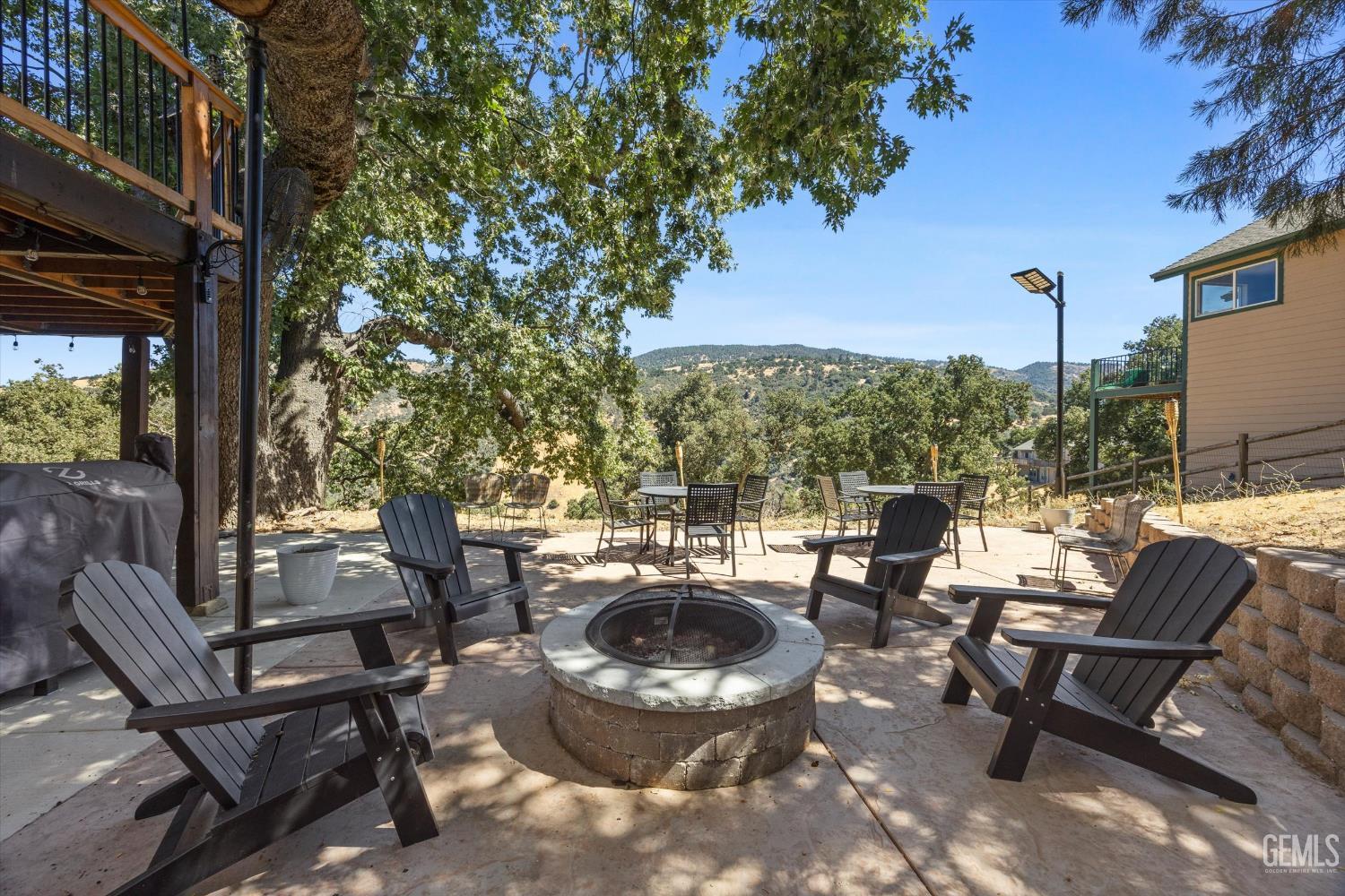 Undisclosed Address Tehachapi, CA 93561 - Photo 55 of 62 a balcony with chairs and a table