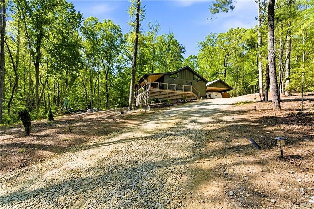 191 Oakwood Road Blairsville, GA 30512 - Photo 38 of 43 a dirt road with trees in the background