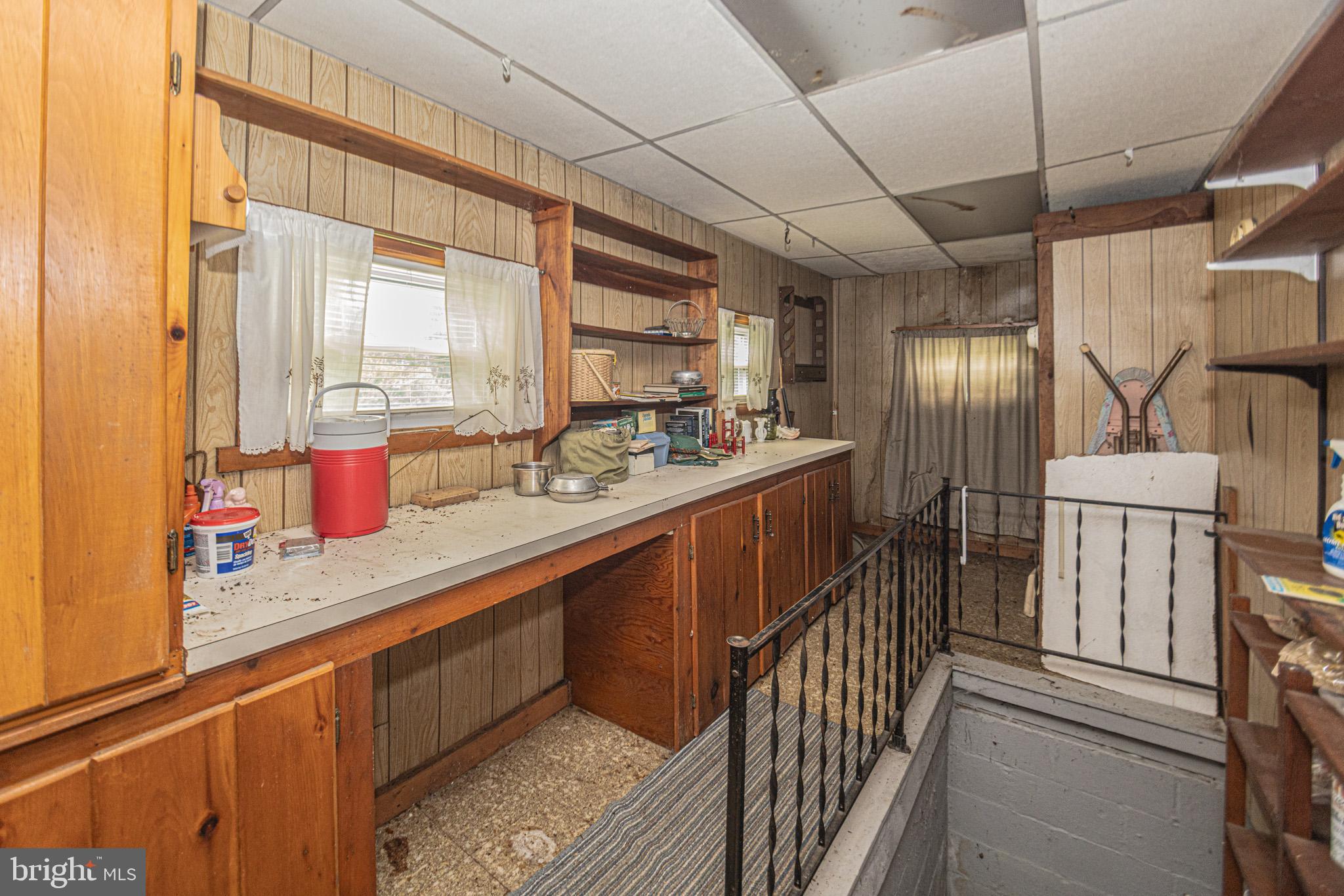 12376 Friendsville Road Friendsville, MD 21531 - Photo 15 of 37 a kitchen with stainless steel appliances granite countertop sink stove and cabinets