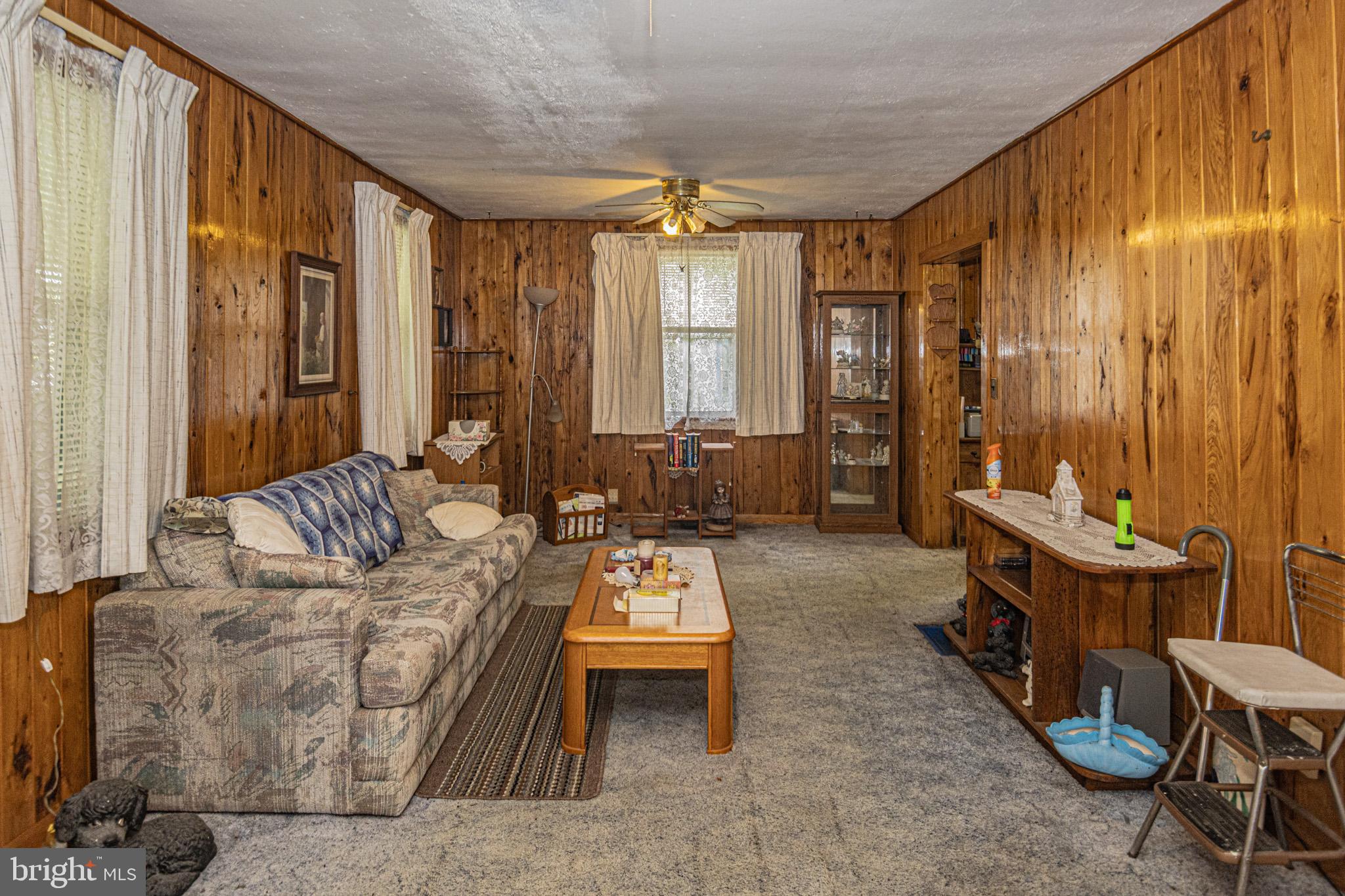 12376 Friendsville Road Friendsville, MD 21531 - Photo 23 of 37 a living room with furniture and large window