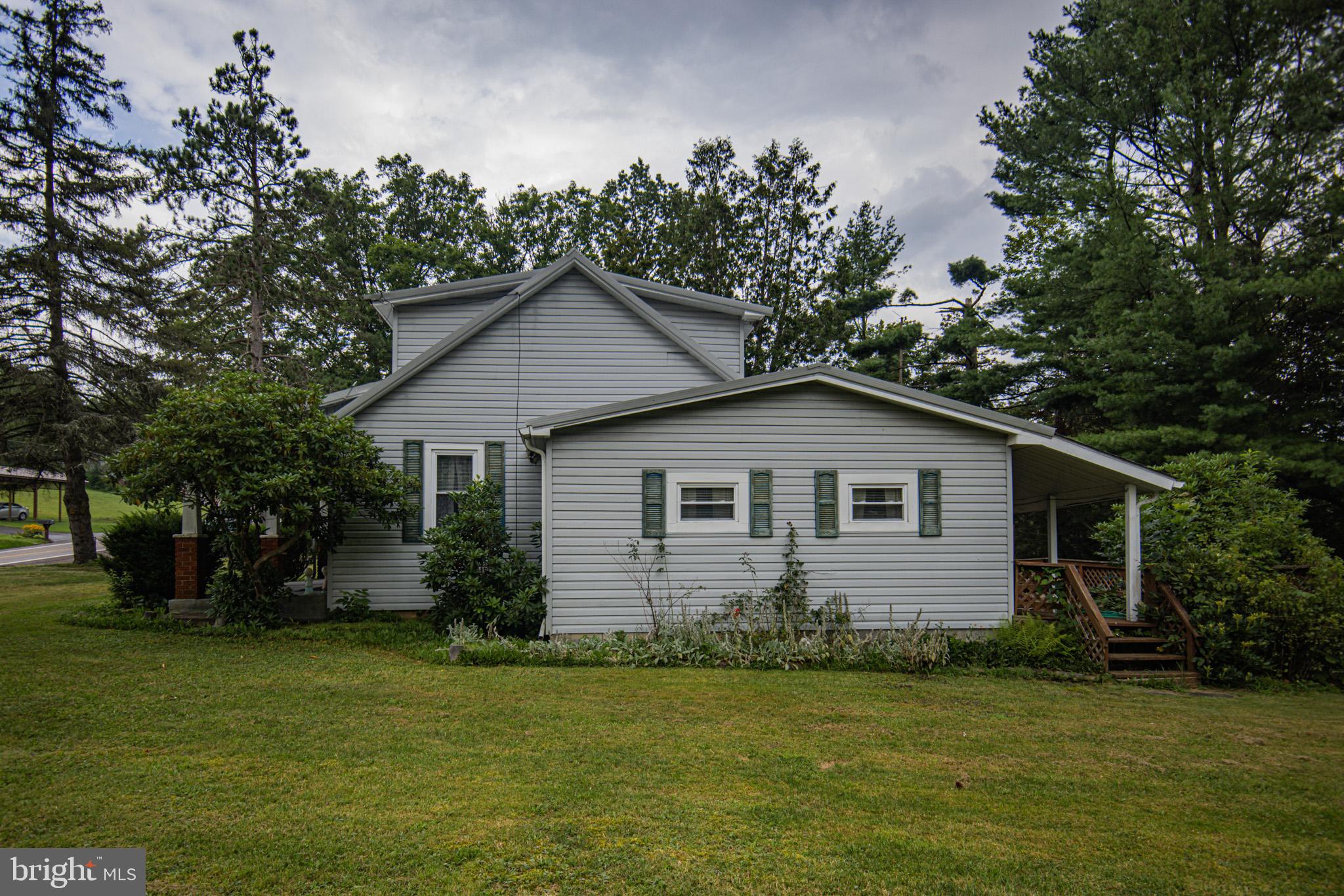 12376 Friendsville Road Friendsville, MD 21531 - Photo 32 of 37 a front view of house with yard and green space