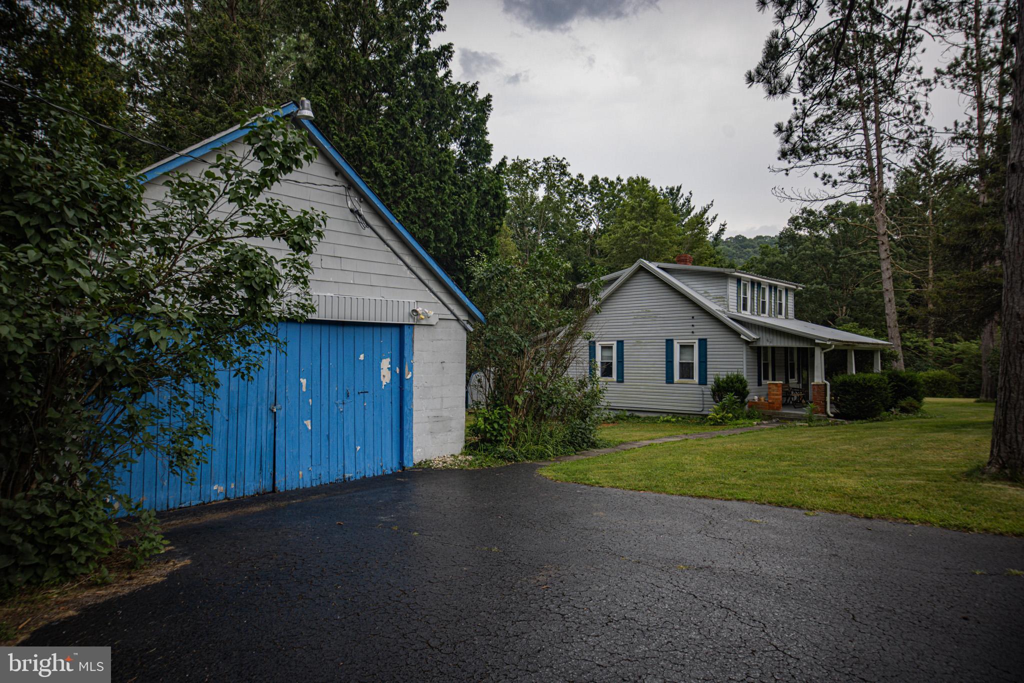 12376 Friendsville Road Friendsville, MD 21531 - Photo 35 of 37 a front view of house with yard and green space