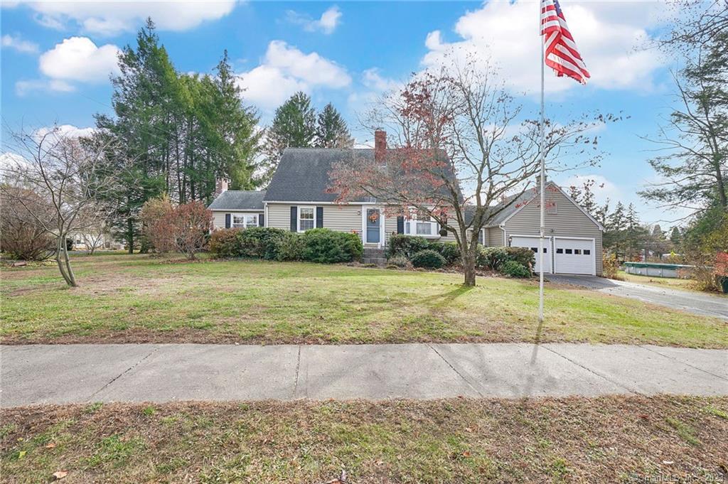 88 Middle Road Enfield, CT 06082 - Photo 1 of 1 a view of a house with a yard and tree s