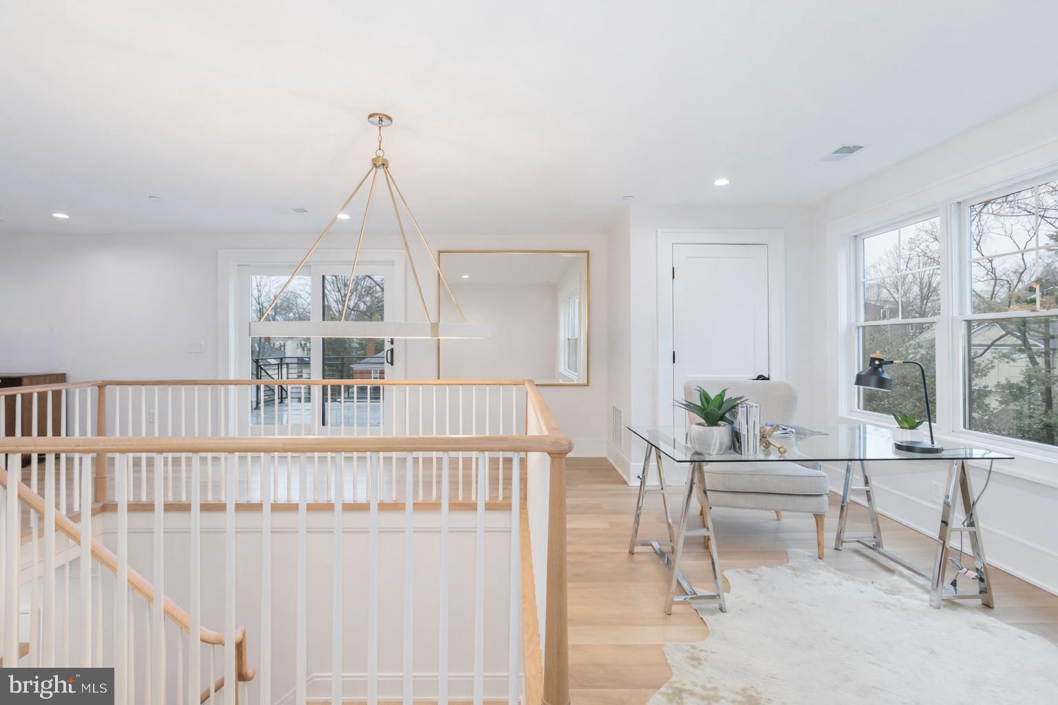 7113 Fairfax Road Bethesda, MD 20814 - Photo 42 of 67 a dining room with a table and chairs