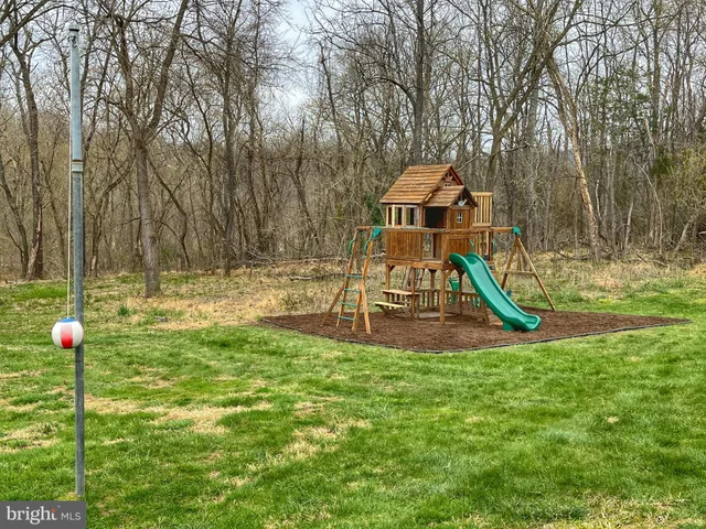 a view of a garden with a slide