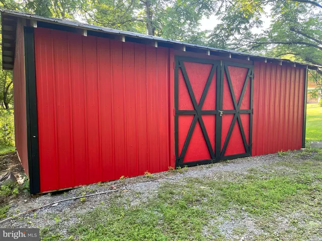 a view of a chairs with wooden floor