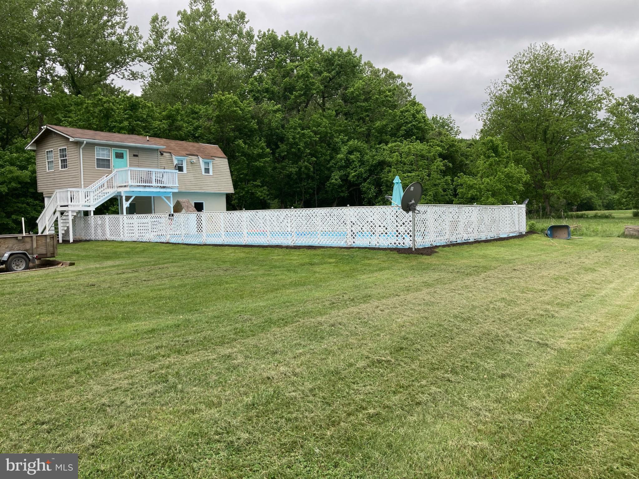 5532 Page Valley Road Luray, VA 22835 - Photo 22 of 42 a view of a house with a yard and sitting area