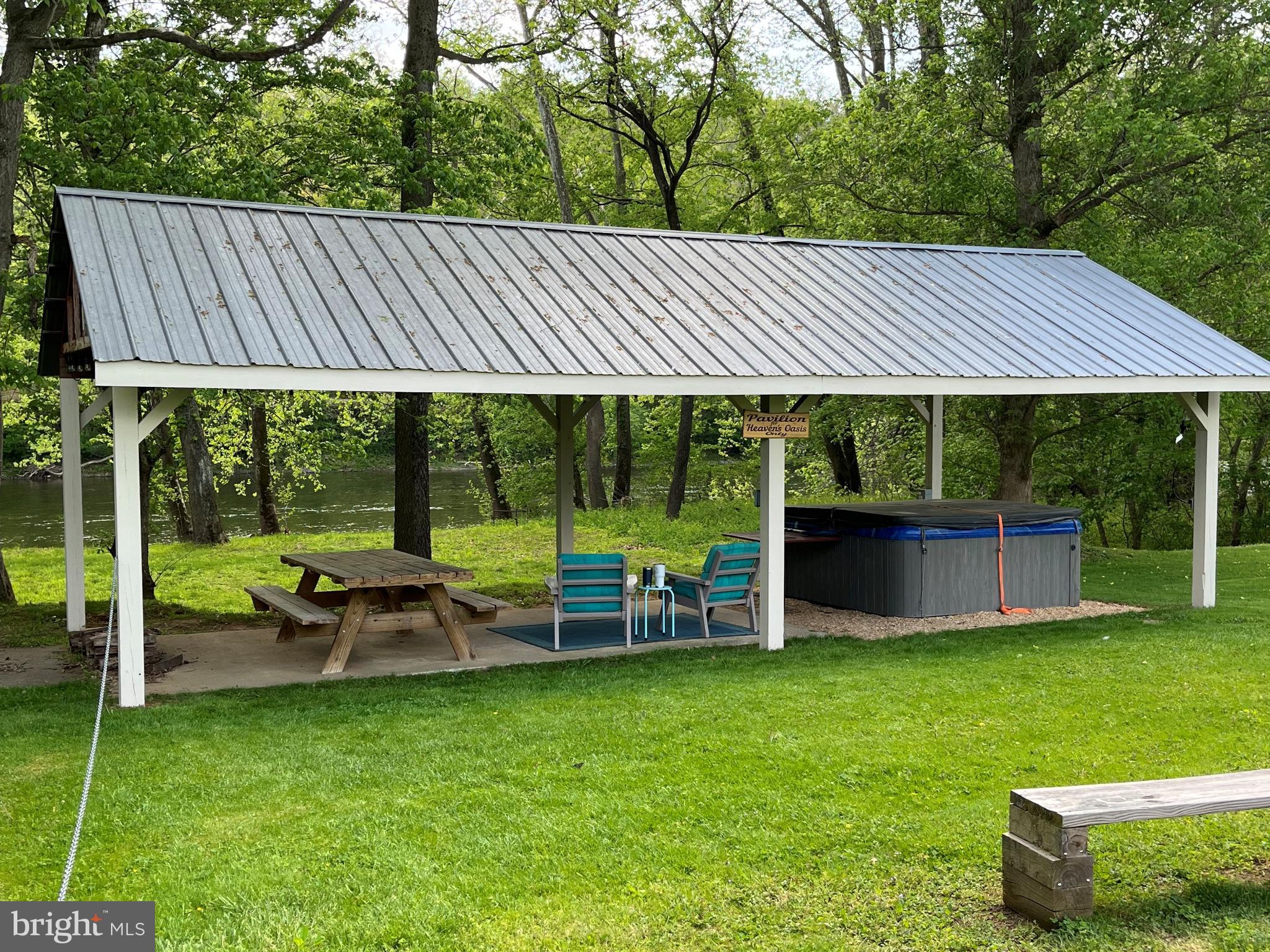 5532 Page Valley Road Luray, VA 22835 - Photo 37 of 42 a view of a house with a backyard patio and a backyard