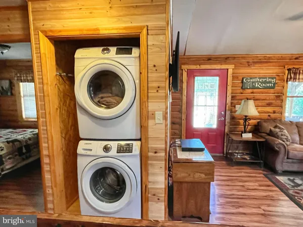 a view of livingroom with washer and dryer