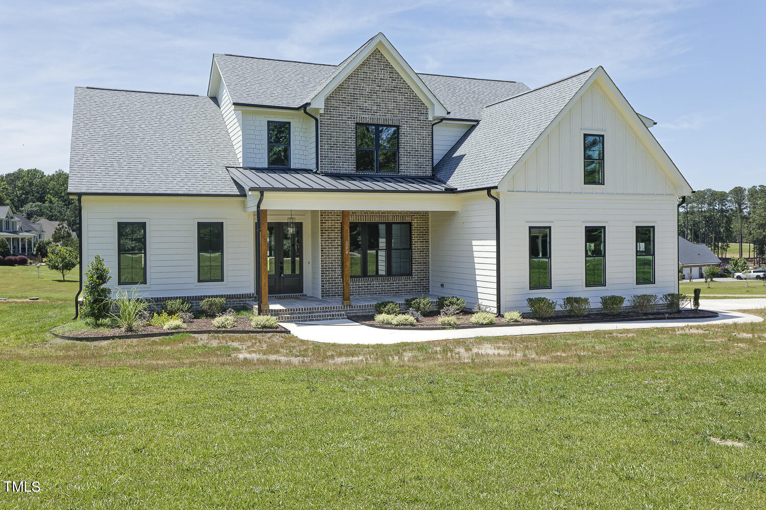 593 Pope Lake Road Angier, NC 27501 - Photo 2 of 48 front view of a house with a yard
