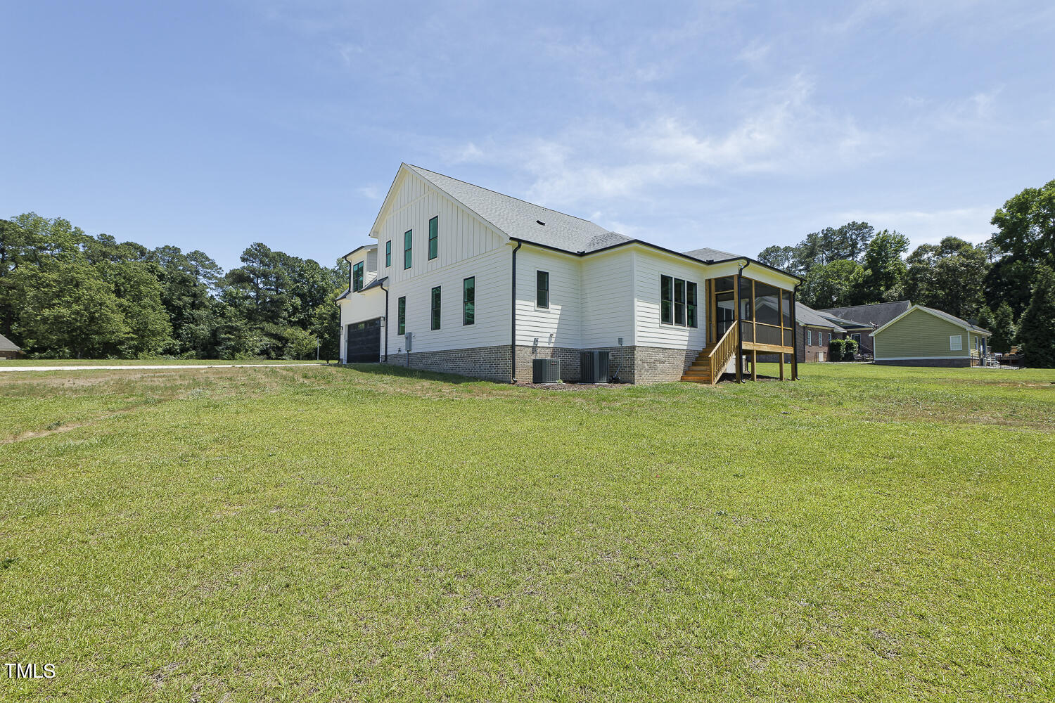 593 Pope Lake Road Angier, NC 27501 - Photo 47 of 48 a view of a house with a big yard and potted plants